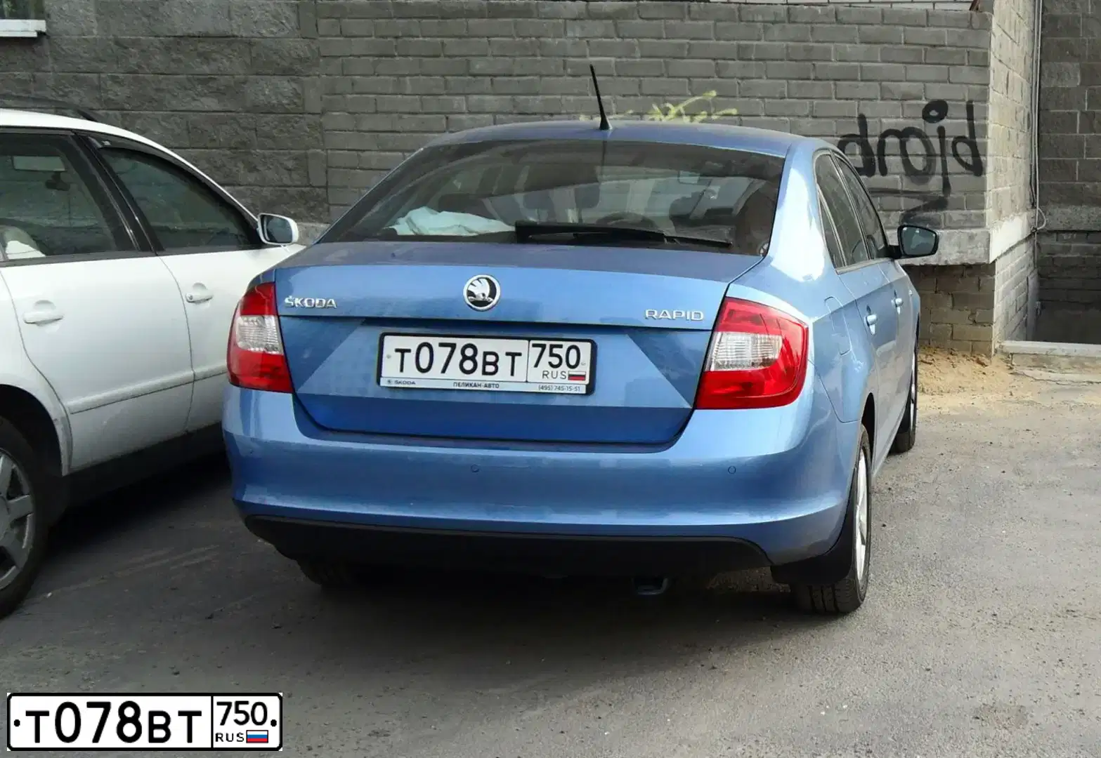 Фото автомобиля SKODA RAPID, 2014 — госномер Т078ВТ750. Цвет: СИНИЙ