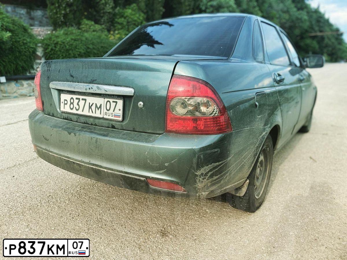 Фото автомобиля ЛАДА 217030 LADA PRIORA, 2010 — госномер Н570АЕ180. Цвет: СЕРО-СИНЕ-ЗЕЛЕНЫЙ