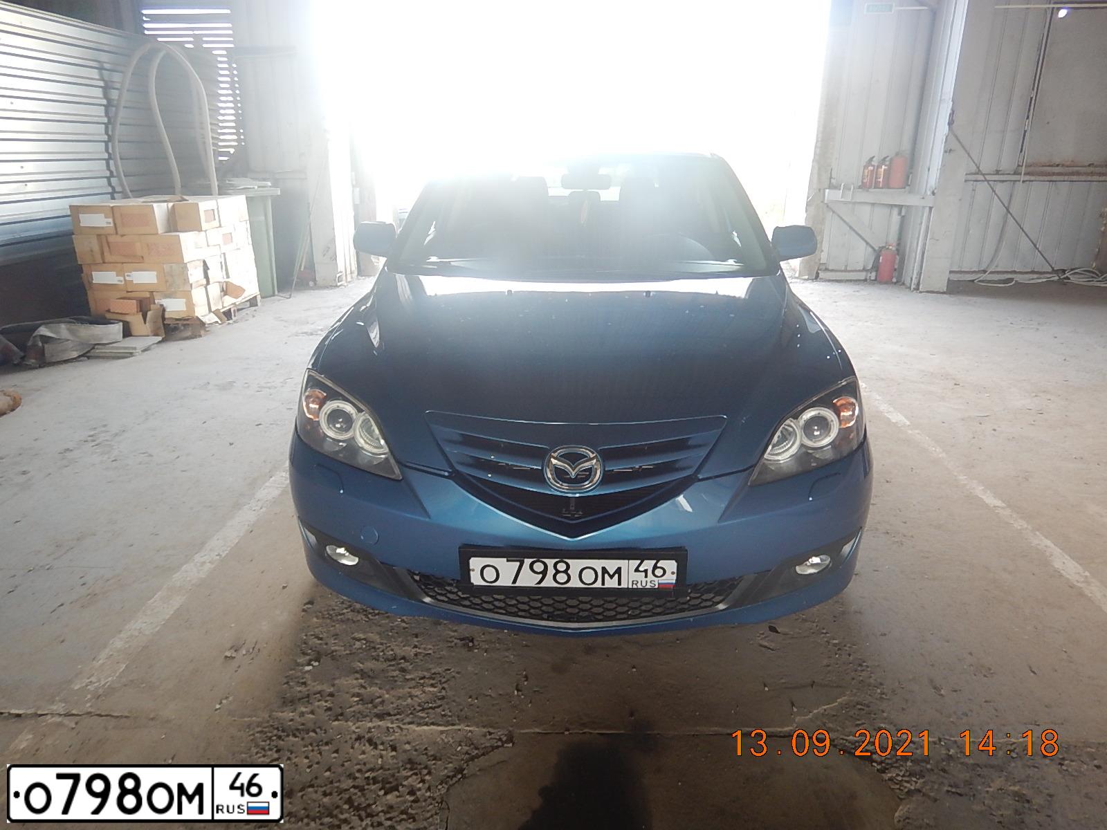 Фото автомобиля MAZDA A 3, 2004 — госномер О798ОМ46. Цвет: ТЕМНО-СИНИЙ