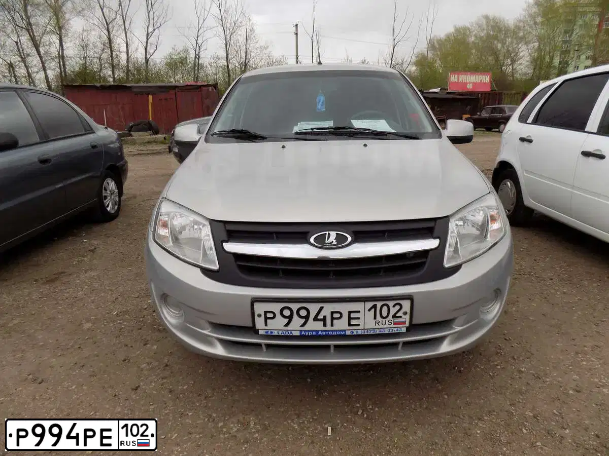Фото автомобиля LADA 2190 GRANTA, 2014 — госномер Р994РЕ102. Цвет: Серебристый