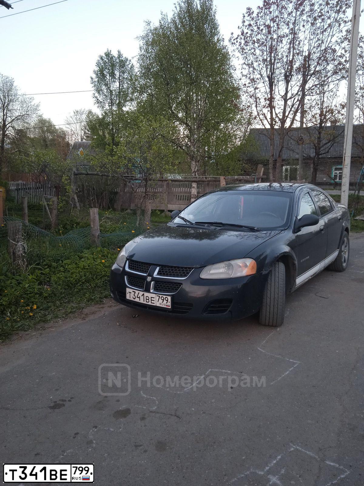 Фото автомобиля DODGE E STRATUS, 2001 — госномер Т111ТМ777. Цвет: ЧЕРНЫЙ