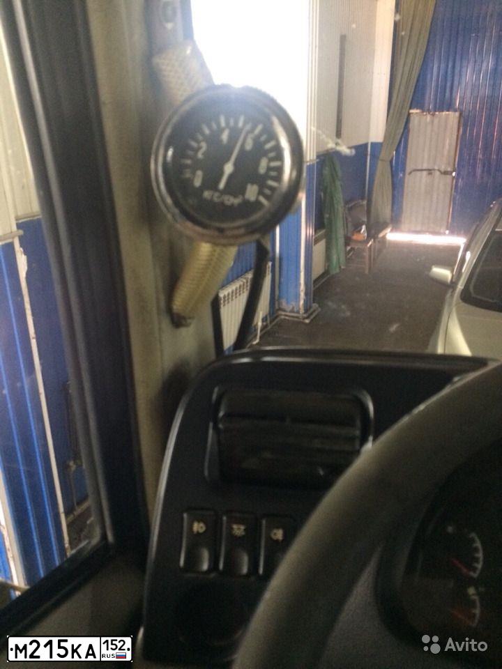 Фото автомобиля DONGFENG DFL-SERIE, 2007 — госномер М215КА152. Цвет: ЖЁЛТЫЙ