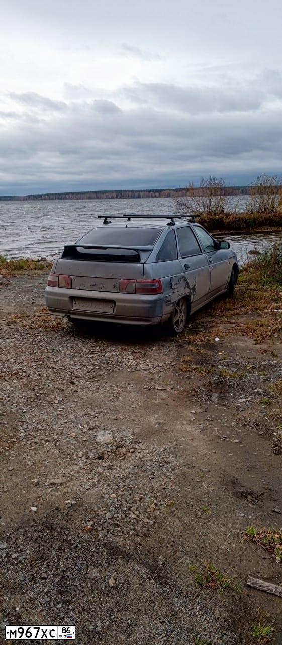 Фото автомобиля LADA 2112, 2007 — госномер Р567РХ86. Цвет: СРЕДНИЙ СЕРО-ЗЕЛЕНЫЙ МЕТ