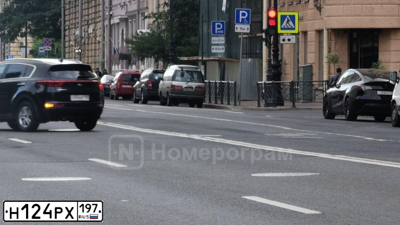 Фото автомобиля SSANGYONG KYRON, 2011 — госномер Н124РХ197. Цвет: СЕРЫЙ