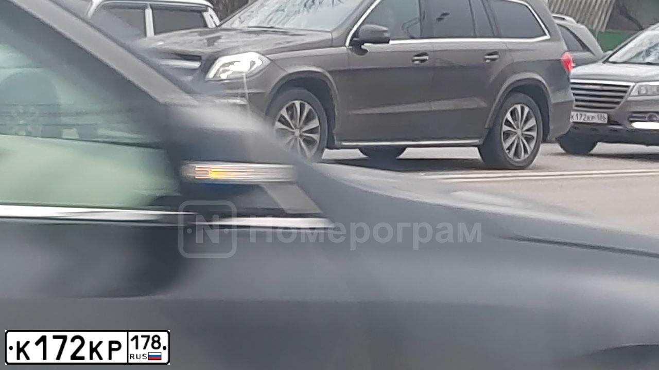 Фото автомобиля SSANGYONG ACTYON, 2011 — госномер А221ОХ51. Цвет: Красный