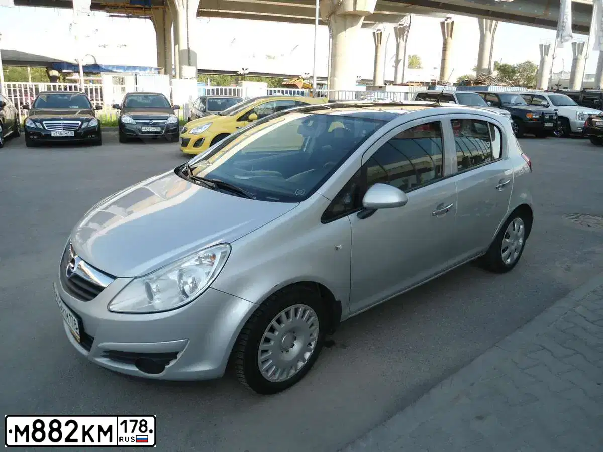 Фото автомобиля OPEL CORSA, 2008 — госномер К441СЕ53. Цвет: Серебристый