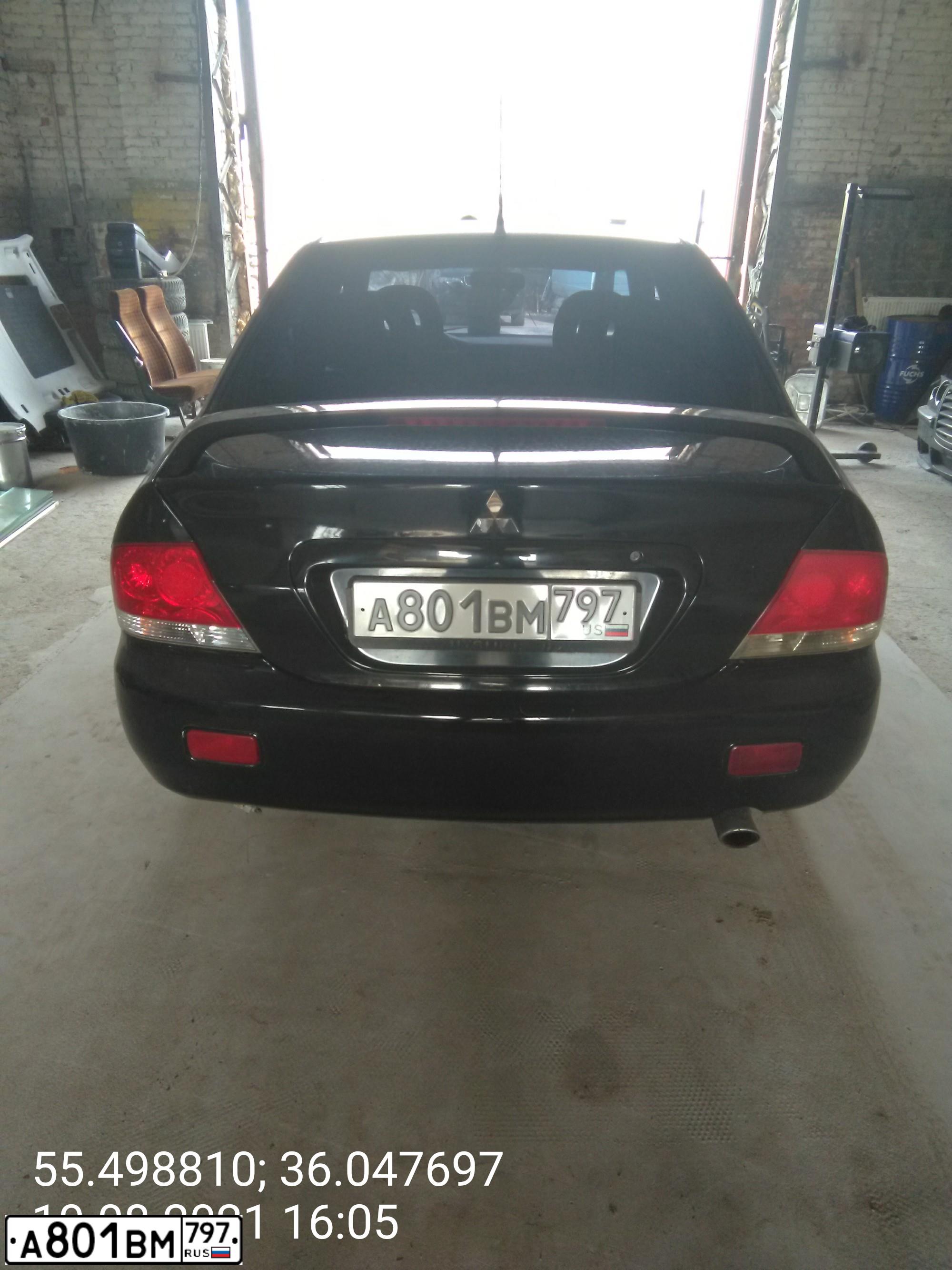 Фото автомобиля MITSUBISHI LANCER, 2006 — госномер Х831КО790. Цвет: ЧЕРНЫЙ
