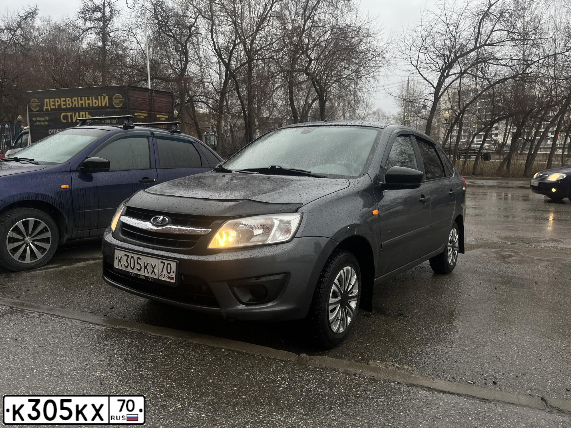 Фото автомобиля LADA 2191 GRANTA, 2016 — госномер К305КХ70. Цвет: ТЕМНО-СЕРЫЙ