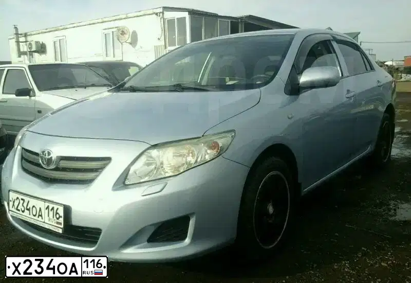 Фото автомобиля TOYOTA COROLLA, 2006 — госномер Х234ОА116. Цвет: СВЕТЛО-ГОЛУБОЙ