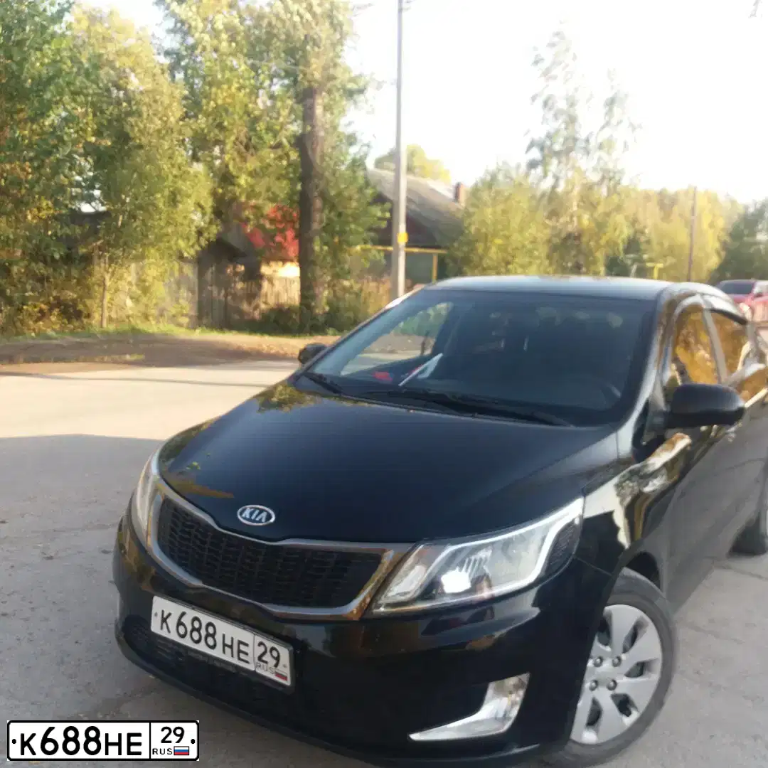 Фото автомобиля KIA RIO, 2011 — госномер К688НЕ29. Цвет: ЧЕРНЫЙ