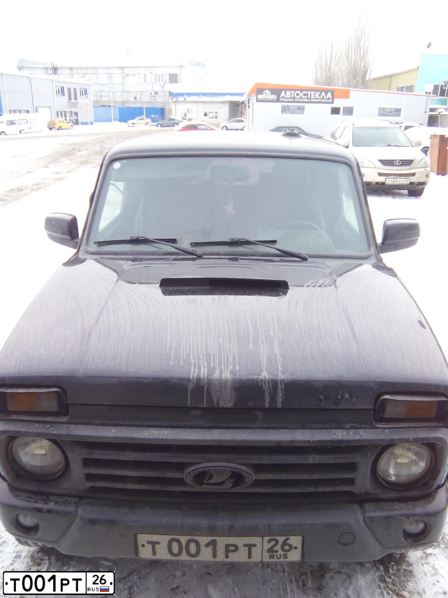 Фото автомобиля BMW X5, 2007 — госномер Т001РТ26. Цвет: БЕЛЫЙ
