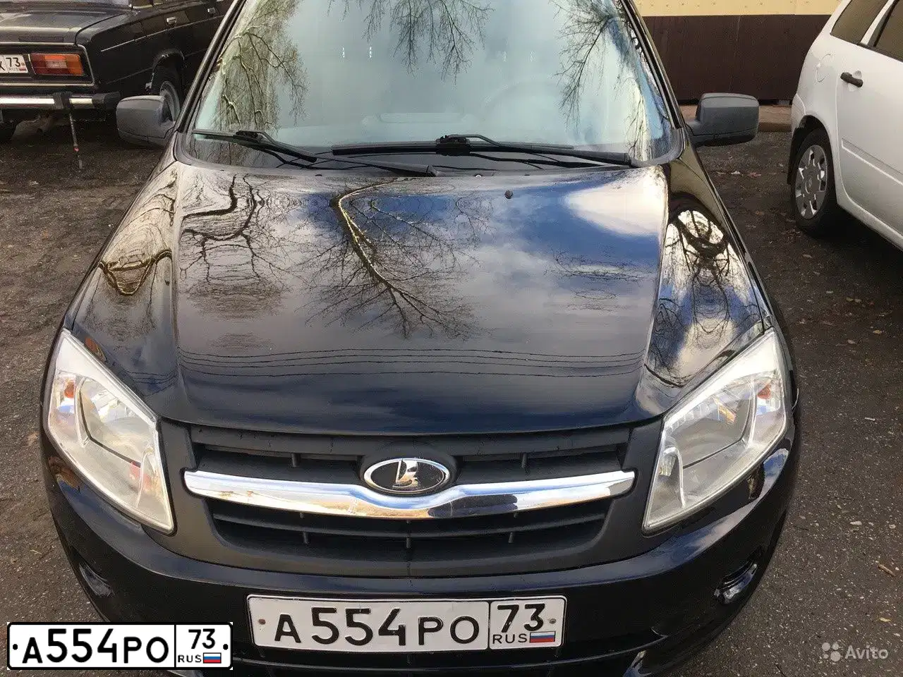 Фото автомобиля LADA GRANTA, 2012 — госномер К566ХР702. Цвет: Сине-Черный