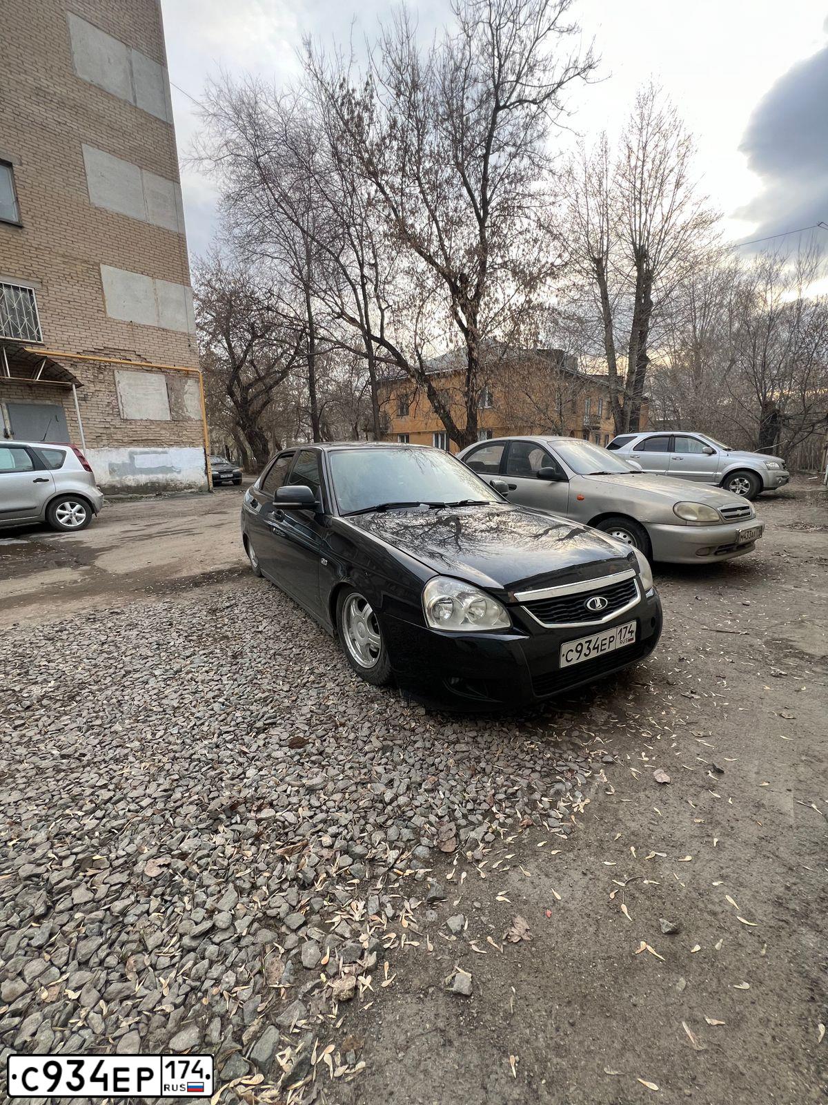 Фото автомобиля LADA 2172 PRIORA, 2008 — госномер С934ЕР174. Цвет: Темно-зеленый