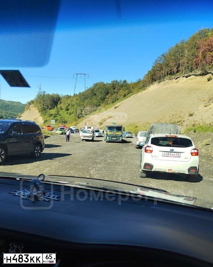 Фото автомобиля SUBARU IMPREZA, 2012 — госномер Н483КК65. Цвет: Белый