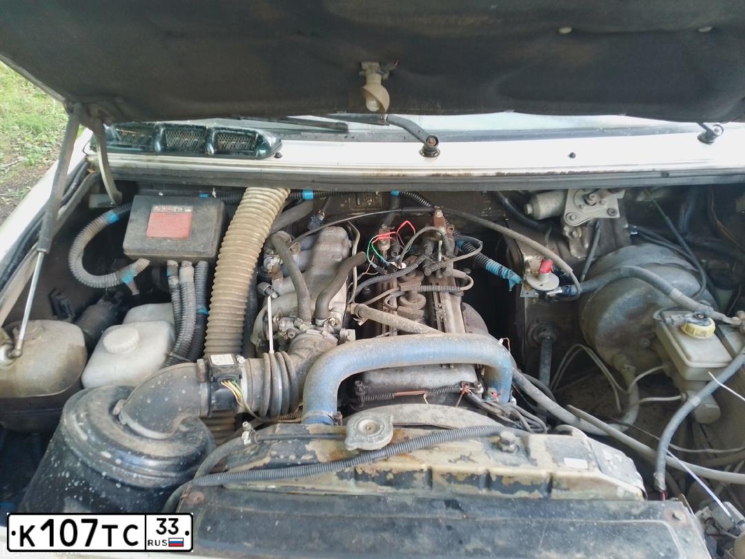 Фото автомобиля UAZ 3163 PATRIOT, 2006 — госномер К107ТС33. Цвет: Серебристый