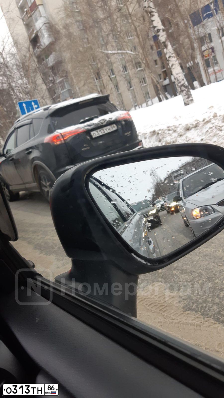 Фото автомобиля TOYOTA RAV4, 2017 — госномер О313ТН86. Цвет: Темно-серый металлик