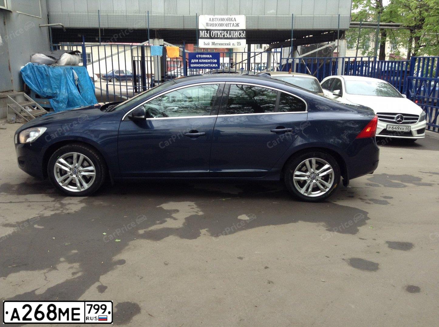 Фото автомобиля VOLVO S60, 2011 — госномер Х300УА77. Цвет: ТЕМНО-СИНИЙ
