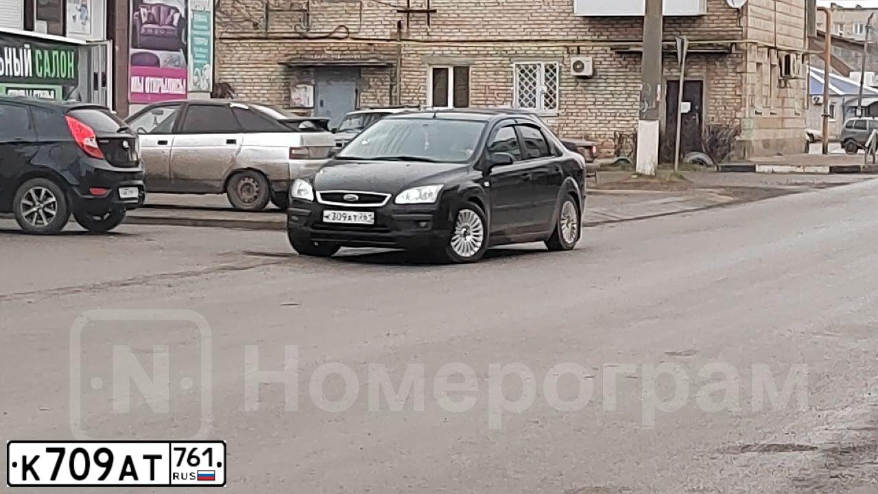 Фото автомобиля LADA 2114 SAMARA, 2009 — госномер К709АТ761. Цвет: СРЕДНИЙ СЕРО-ЗЕЛЕНЫЙ МЕТ.