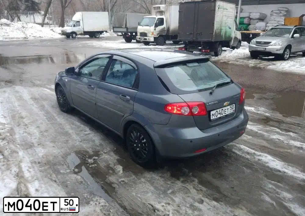 Фото автомобиля AZLK MOSKWITSCH 2141, 1994 — госномер Х131АН50. Цвет: Белый