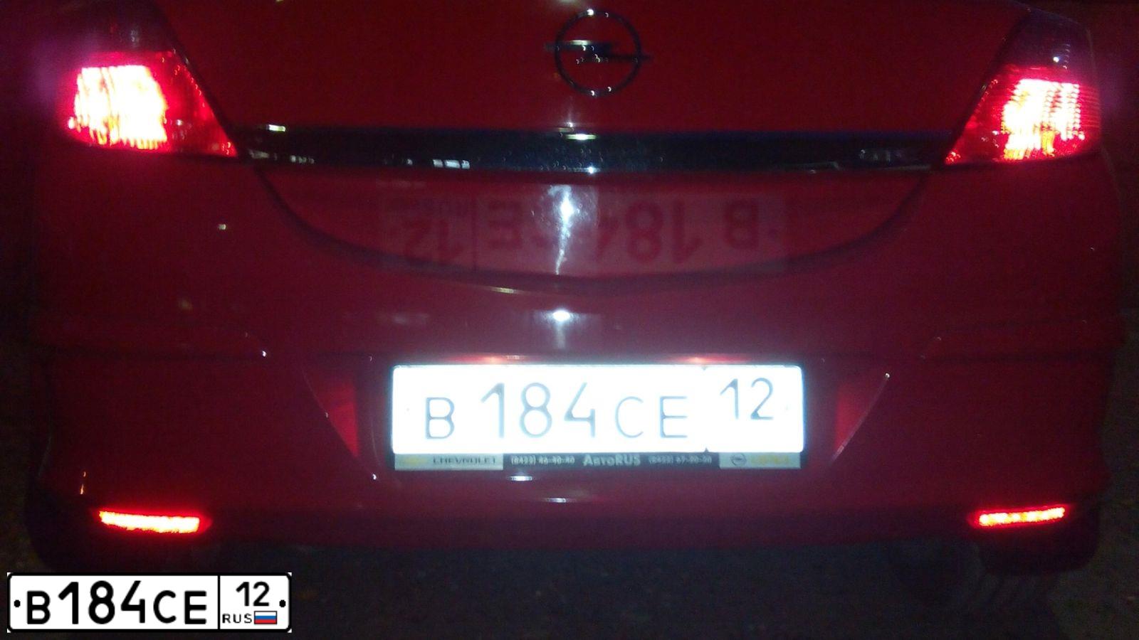 Фото автомобиля OPEL ASTRA, 2007 — госномер Н712КТ21. Цвет: КРАСНЫЙ