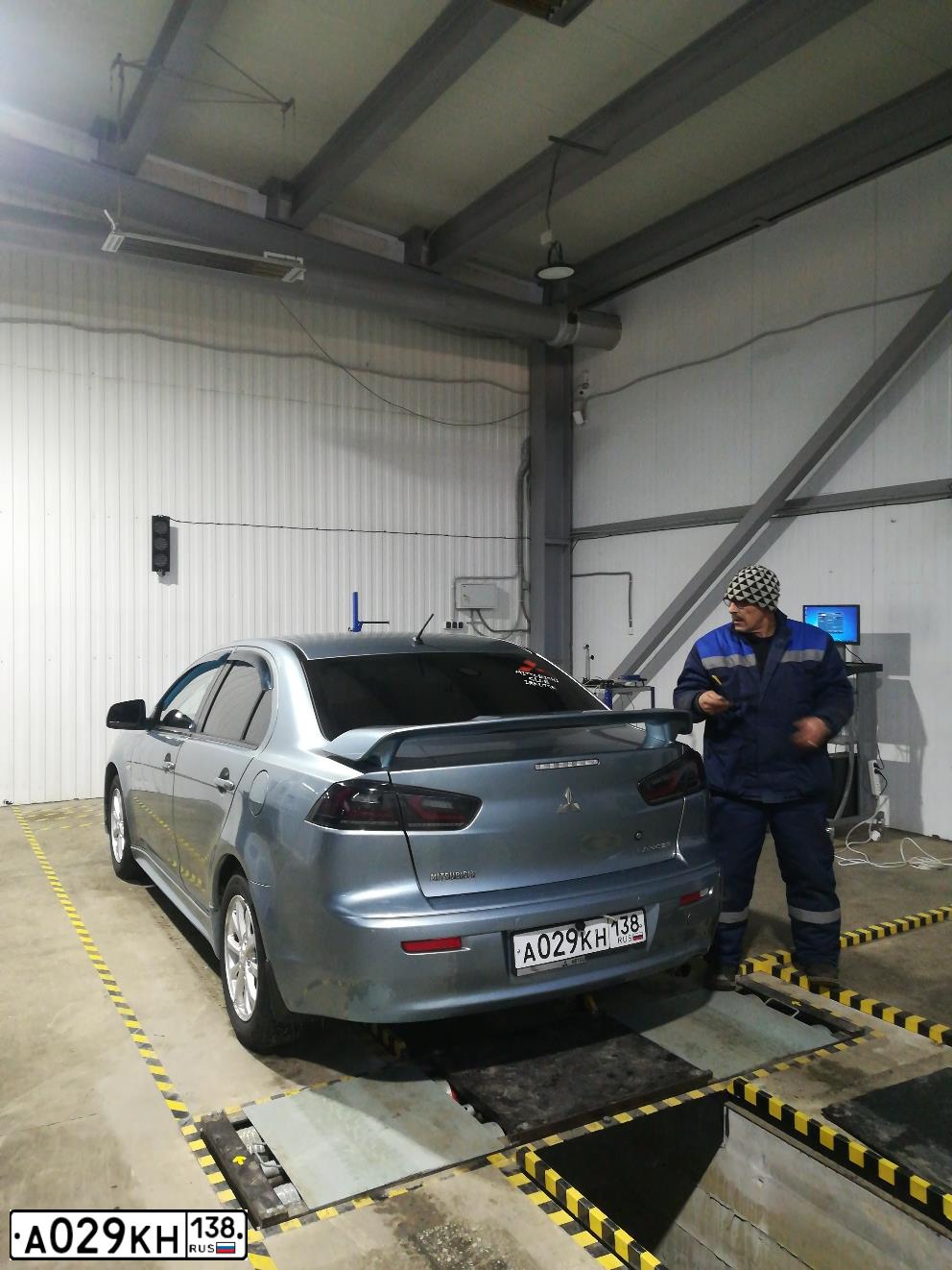 Фото автомобиля MITSUBISHI LANCER, 2011 — госномер А029КН138. Цвет: СЕРО ЗЕЛЕНЫЙ
