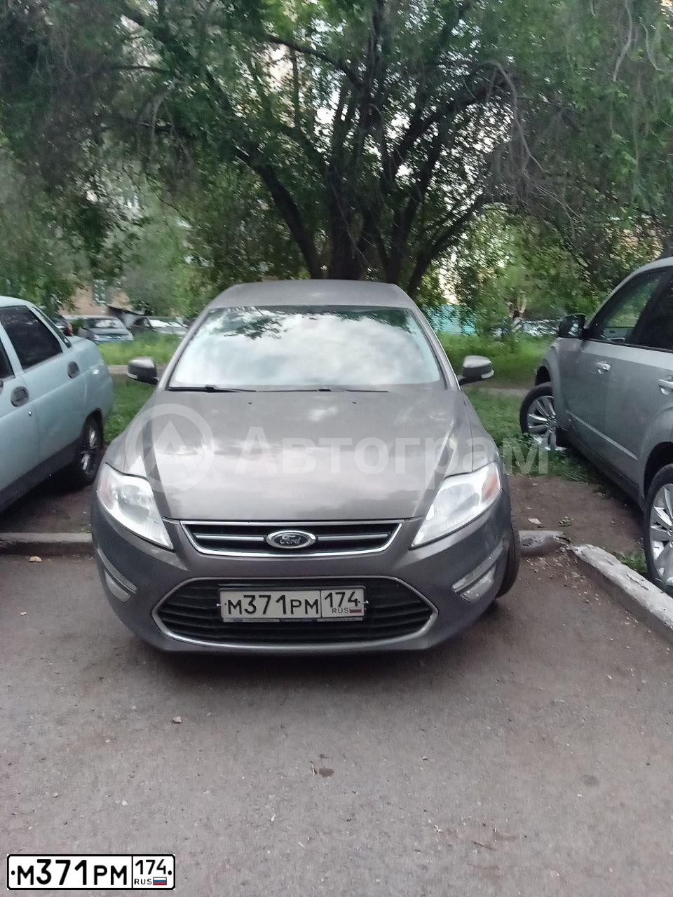 Фото автомобиля FORD MONDEO, 2012 — госномер М371РМ174. Цвет: КОРИЧНЕВЫЙ