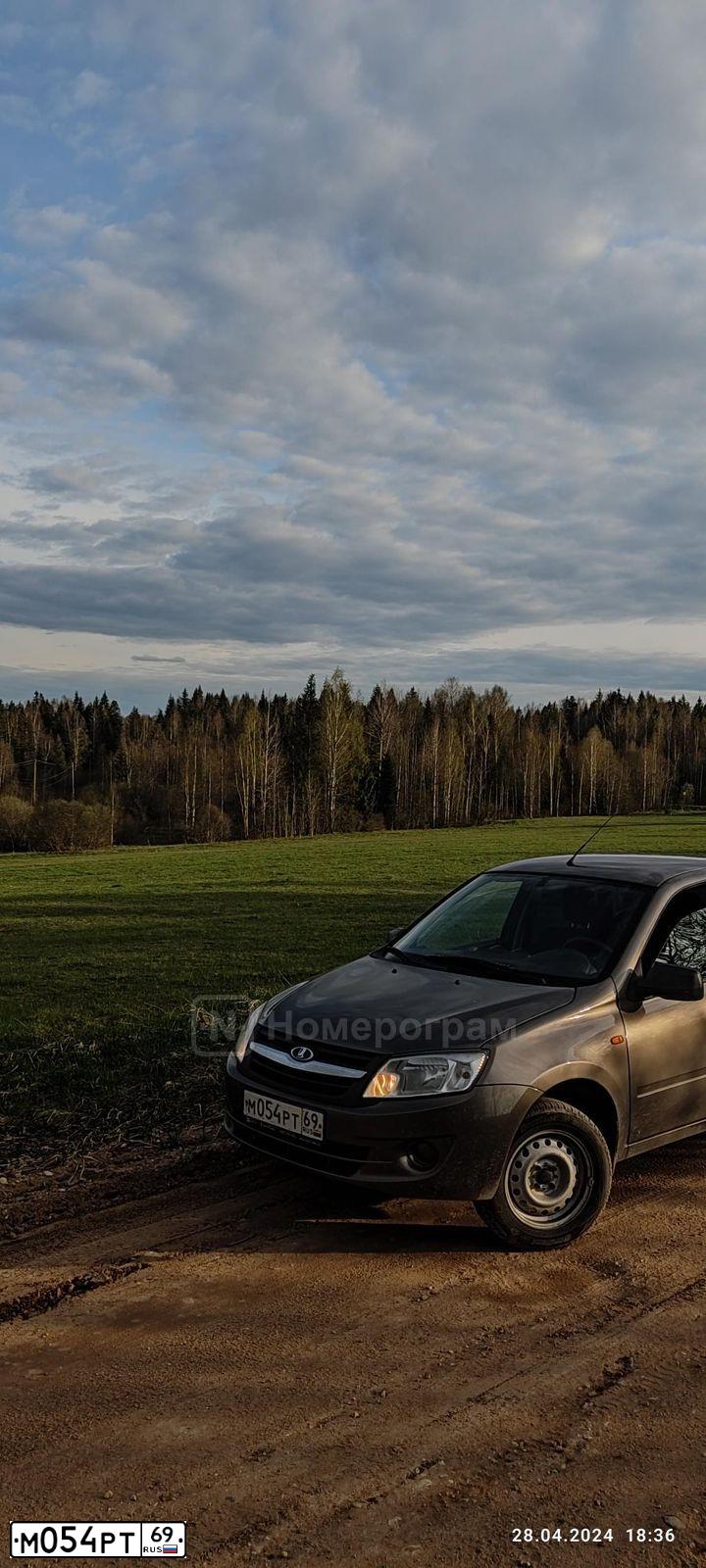 Фото автомобиля LADA 2190 GRANTA, 2014 — госномер М054РТ69. Цвет: ЗОЛОТИСТО-КОРИЧНЕВЫЙ