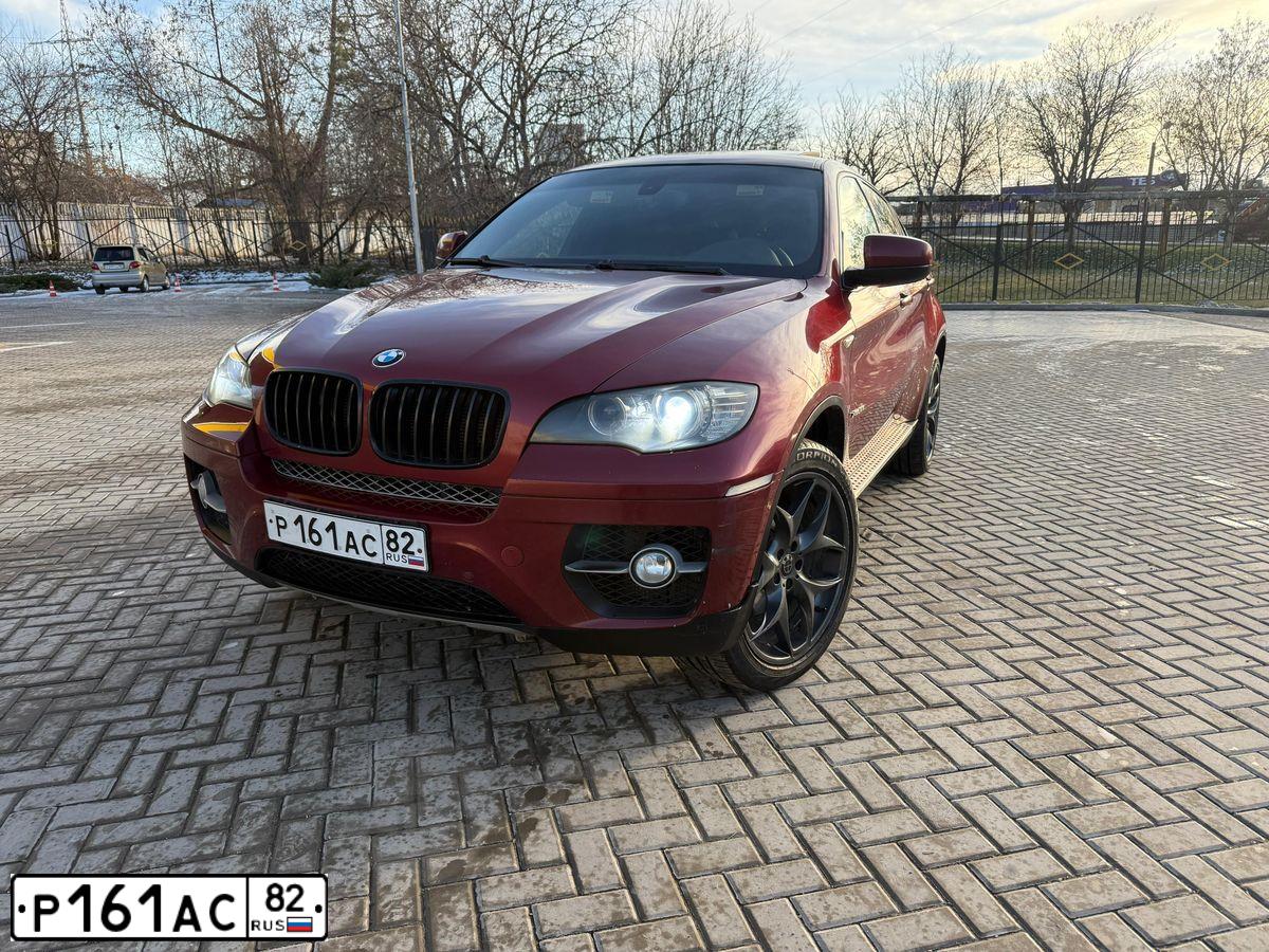 Фото автомобиля BMW X6, 2008 — госномер В302КН92. Цвет: Красный