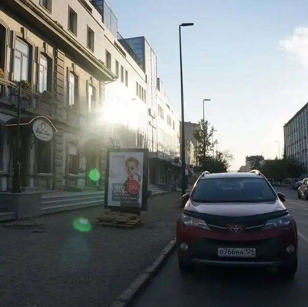 Фото автомобиля TOYOTA RAV4, 2015 — госномер О766НА124. Цвет: КРАСНЫЙ
