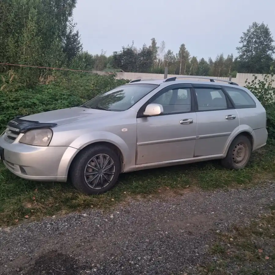 Фото автомобиля CHEVROLET LACETTI, 2012 — госномер К783ОС77. Цвет: СЕРЫЙ СВЕТЛЫЙ