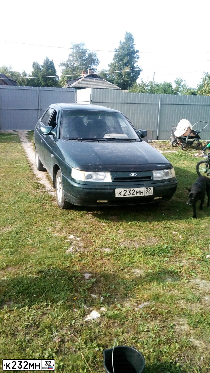 Фото автомобиля LADA 2112, 2004 — госномер К232МН32. Цвет: Темно-зеленый