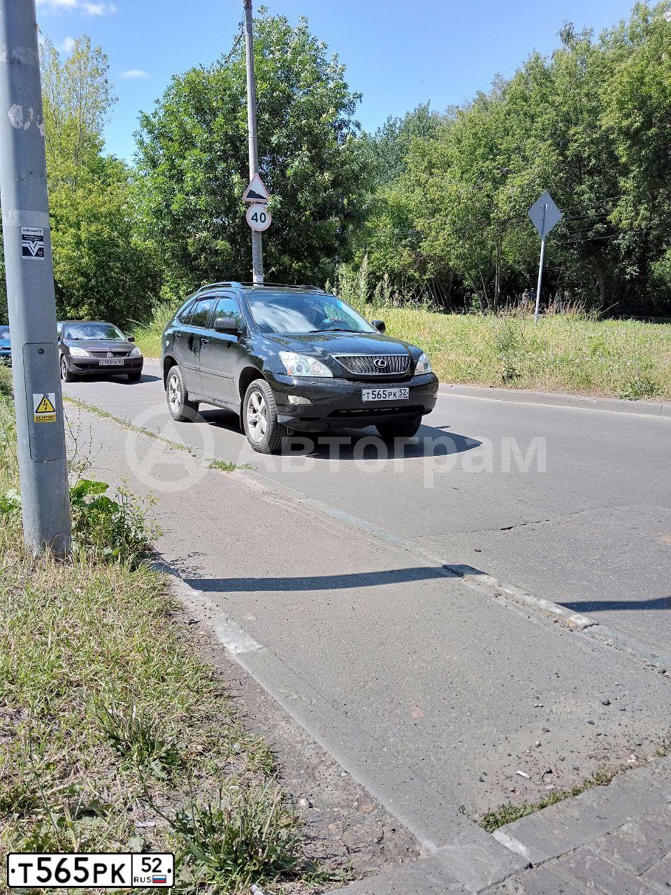 Фото автомобиля HYUNDAI SANTA FE, 2007 — госномер Т565РК52. Цвет: ЧЕРНЫЙ