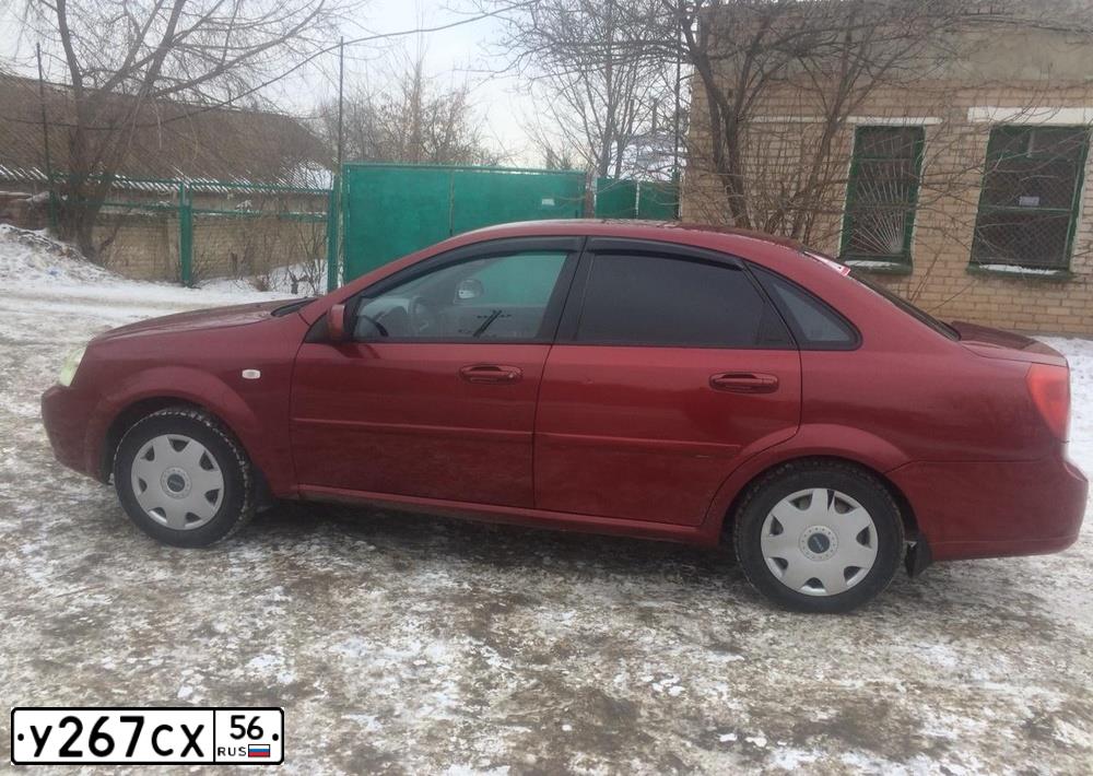 Фото автомобиля CHEVROLET LACETTI, 2008 — госномер У267СХ56. Цвет: Красный
