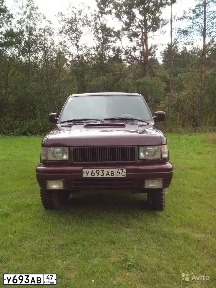Фото автомобиля ISUZU TROOPER, 1992 — госномер А083КА198. Цвет: Вишневый