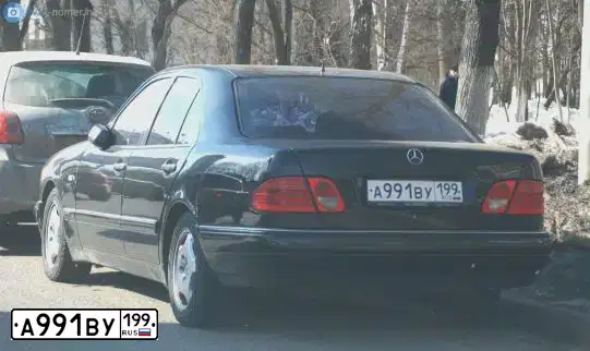 Фото автомобиля MERCEDES E-KLASSE, 1998 — госномер О311ЕМ11. Цвет: ЧЕРНЫЙ