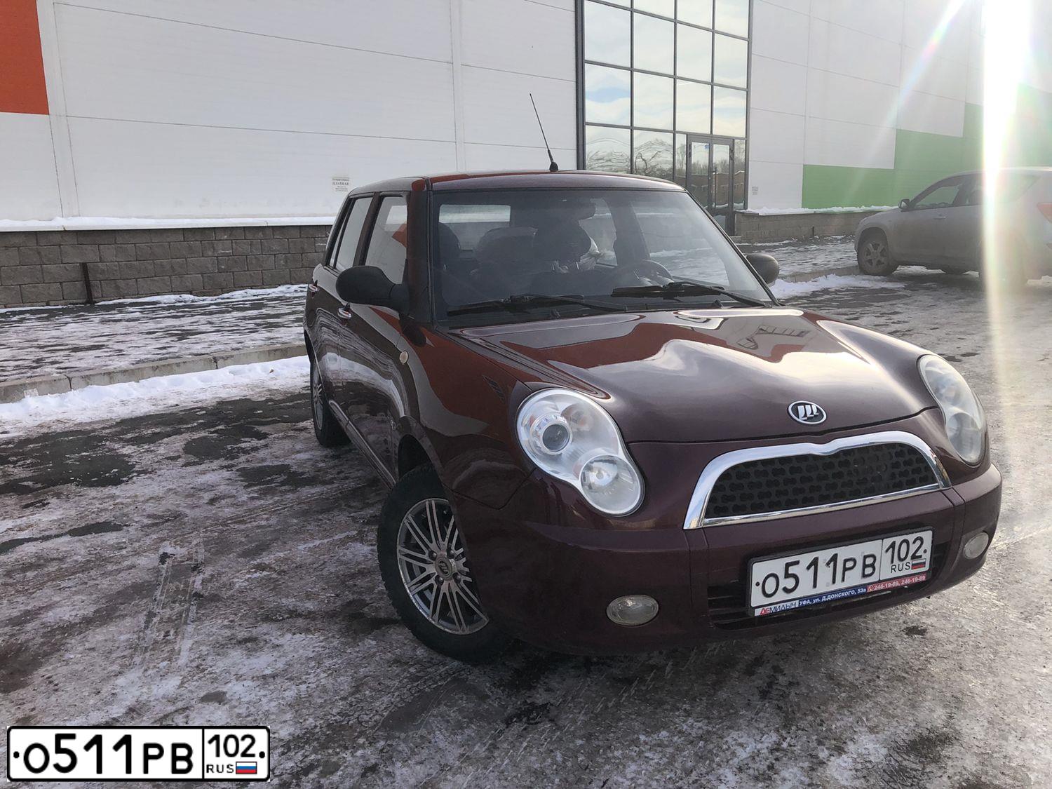 Фото автомобиля LIFAN SMILY, 2013 — госномер О511РВ102. Цвет: ТЕМНО-ВИШНЕВЫЙ