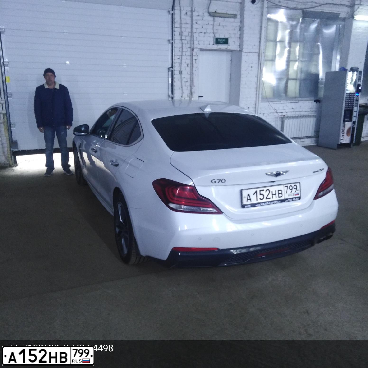 Фото автомобиля GENESIS G70, 2018 — госномер Р707СР797. Цвет: Белый