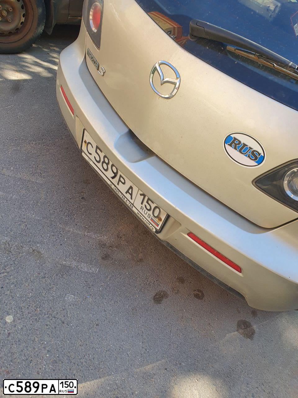 Фото автомобиля MAZDA 3, 2007 — госномер О312КУ134. Цвет: СЕРО-ЗОЛОТИСТЫЙ