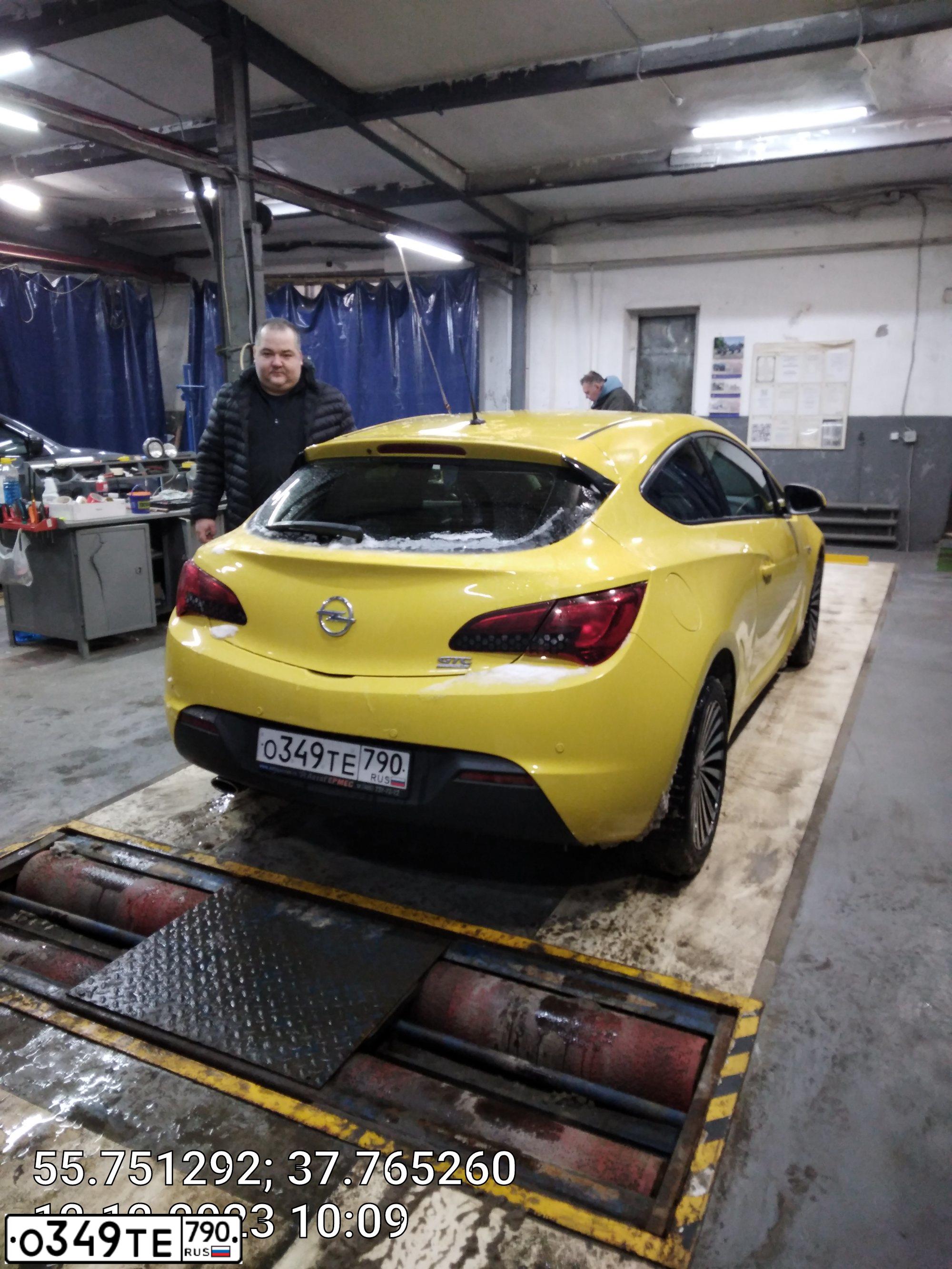 Фото автомобиля ОПЕЛЬ АСТРА GTC P-J/SW, 2012 — госномер Т705СВ58. Цвет: ЖЁЛТЫЙ
