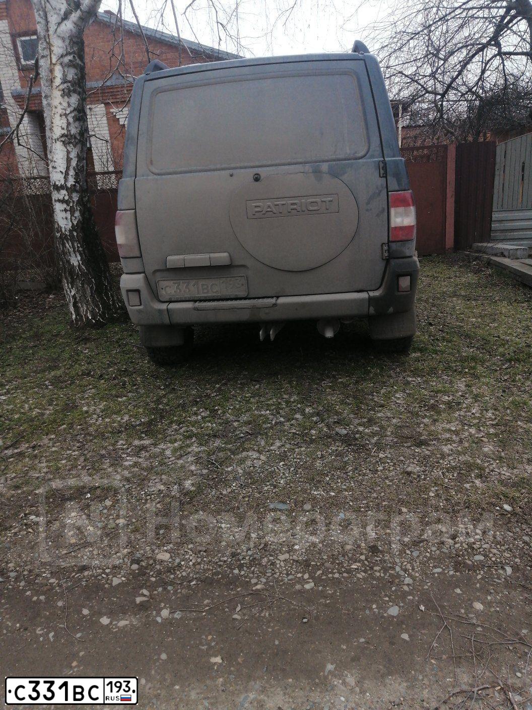 Фото автомобиля UAZ 3163 PATRIOT, 2010 — госномер Х005ЕА136. Цвет: Темно-зеленый