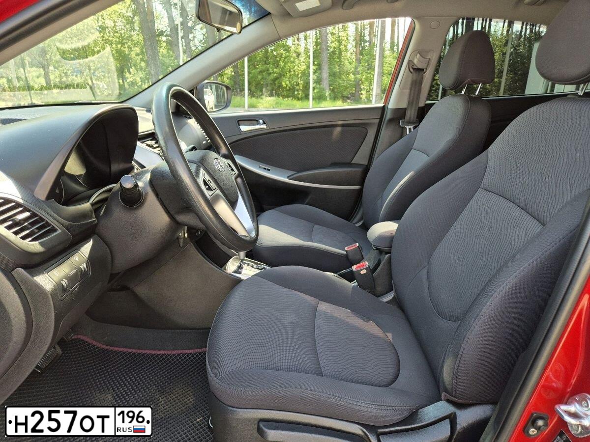 Фото автомобиля HYUNDAI SOLARIS, 2013 — госномер Н257ОТ196. Цвет: ТЕМНО-КРАСНЫЙ