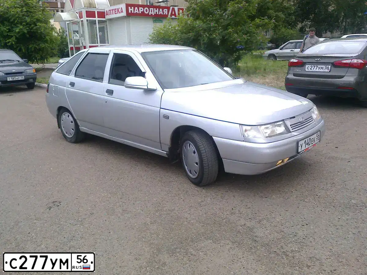 Фото автомобиля OPEL ASTRA, 2011 — госномер Х256УТ56. Цвет: синий