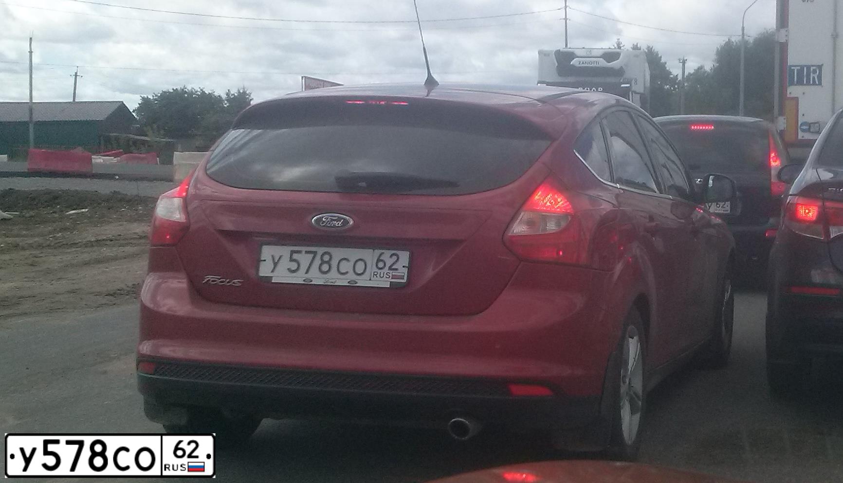 Фото автомобиля FORD FOCUS, 2012 — госномер У659ЕУ71. Цвет: КРАСНЫЙ