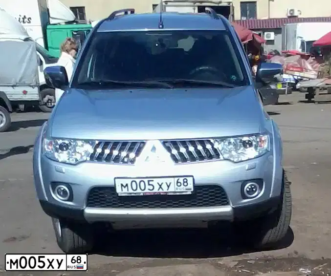 Фото автомобиля MITSUBISHI PAJERO SPORT, 2011 — госномер М005ХУ68. Цвет: СЕРЕБРИСТЫЙ