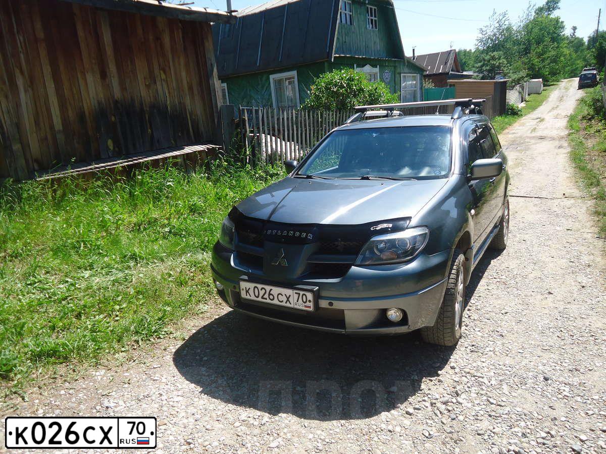 Фото автомобиля MITSUBISHI OUTLANDER 2.4, 2004 — госномер Х678АА154. Цвет: Серый