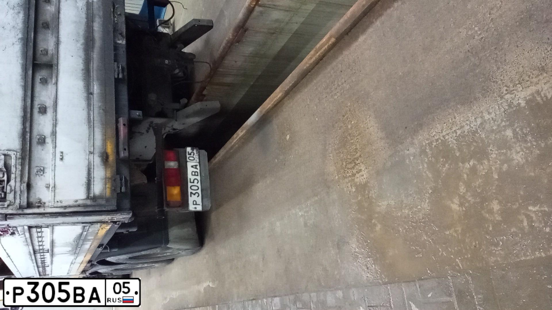 Фото автомобиля MAZ MAN MAZ-MAN 6312 /6X4/, 2011 — госномер Р305ВА05. Цвет: Белый