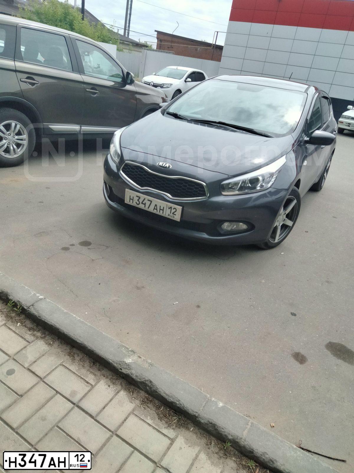 Фото автомобиля KIA CEE'D, 2013 — госномер Н347АН12. Цвет: СЕРЫЙ