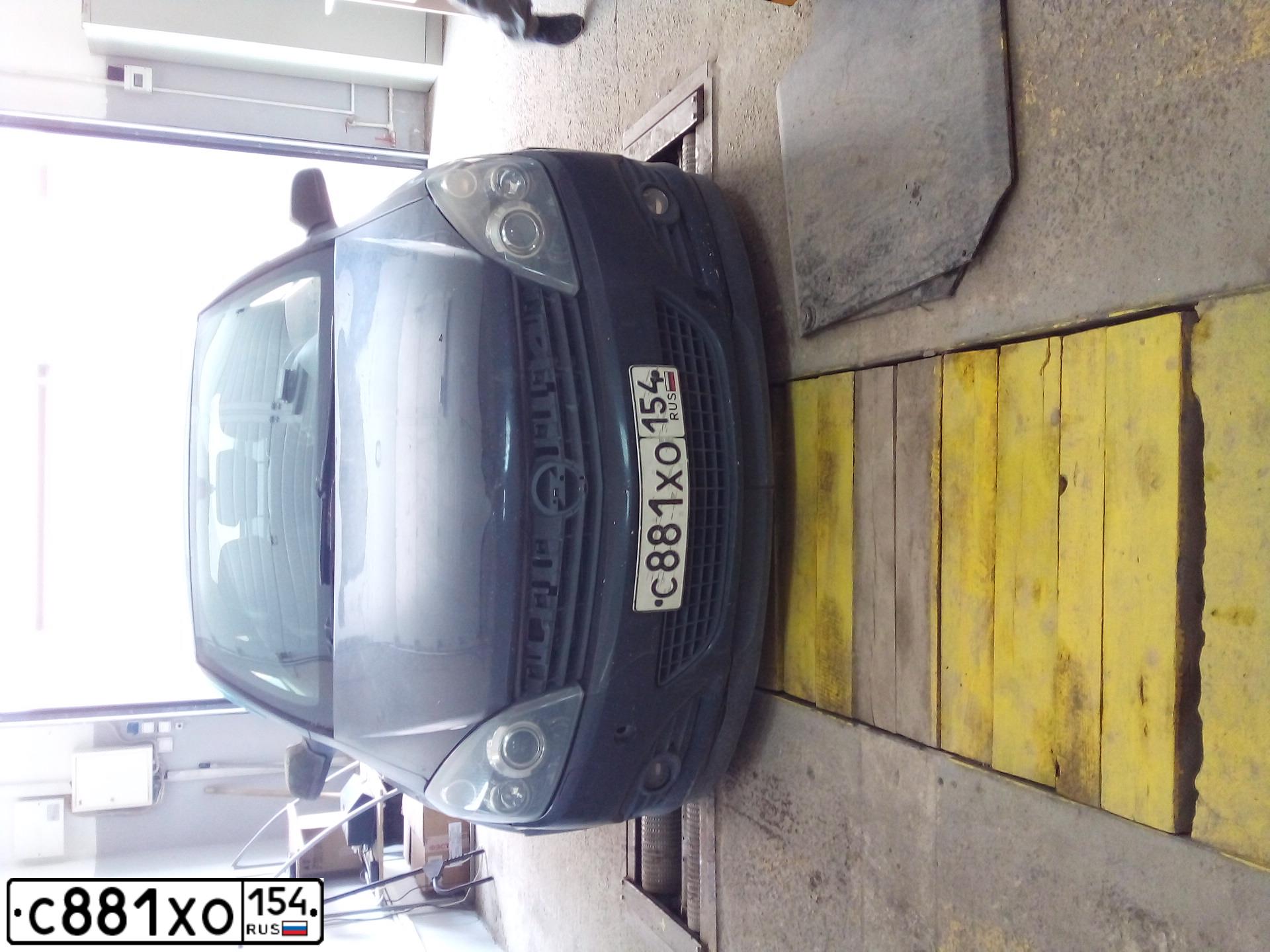 Фото автомобиля OPEL ASTRA, 2007 — госномер М823КН154. Цвет: ЧЕРНЫЙ
