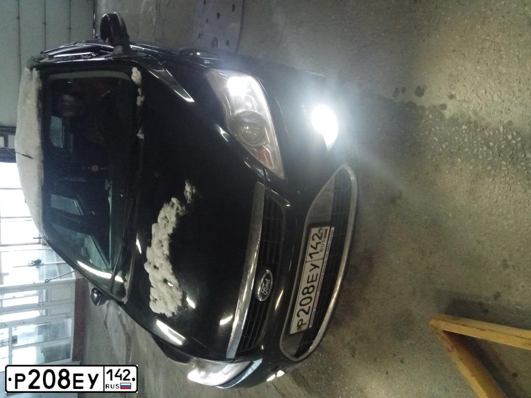 Фото автомобиля FORD FOCUS, 2008 — госномер М183ТА154. Цвет: ЧЕРНЫЙ