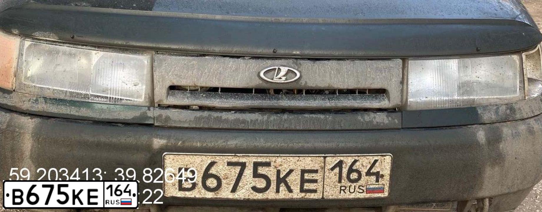 Фото автомобиля LADA 2112, 2006 — госномер Е718КК164. Цвет: ЗОЛОТИСТЫЙ ТЕМНО-ЗЕЛЕНЫЙ